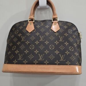 Louis Vuitton Monogram Alma Satchel in Brown and Natural Vachetta